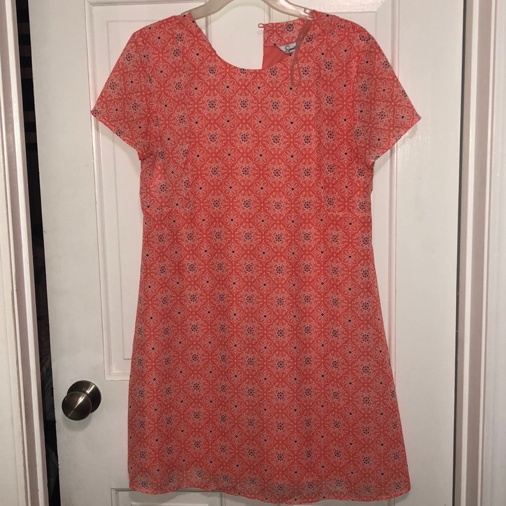 Orange flowered pattern dress